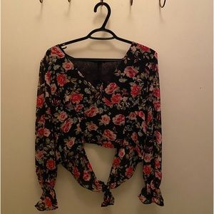 Cropped, open back, long sleeve flower top from Dynamite